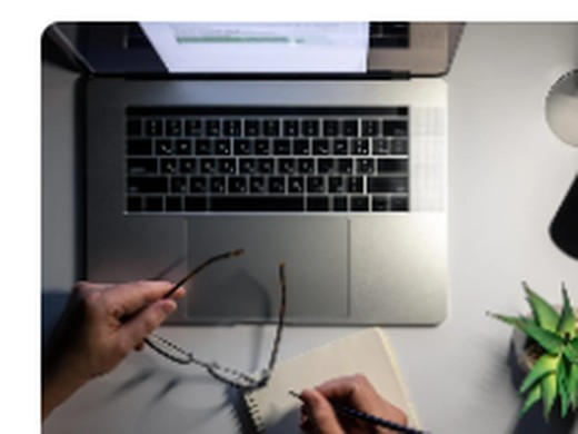 Laptop viewed from above on a modern workspace